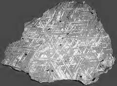 Fig. 1-5. Textura de Widmanstätten, en meteorito metálico.