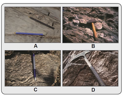 Figura 4.16. Rocas características del metamorfismo regional. A: Pizarra, con posibilidad de determinar los planos de estratificación por la presencia de finos estratos arenosos (birome azul). La incipiente esquistosidad está indicada por la birome negra. B: Esquisto biotítico, conteniendo filones de granito deformados. C: Paragneis, con foliación donde alternan bandas de minerales claros con bandas de minerales oscuros. D: Ortogneis granítico.